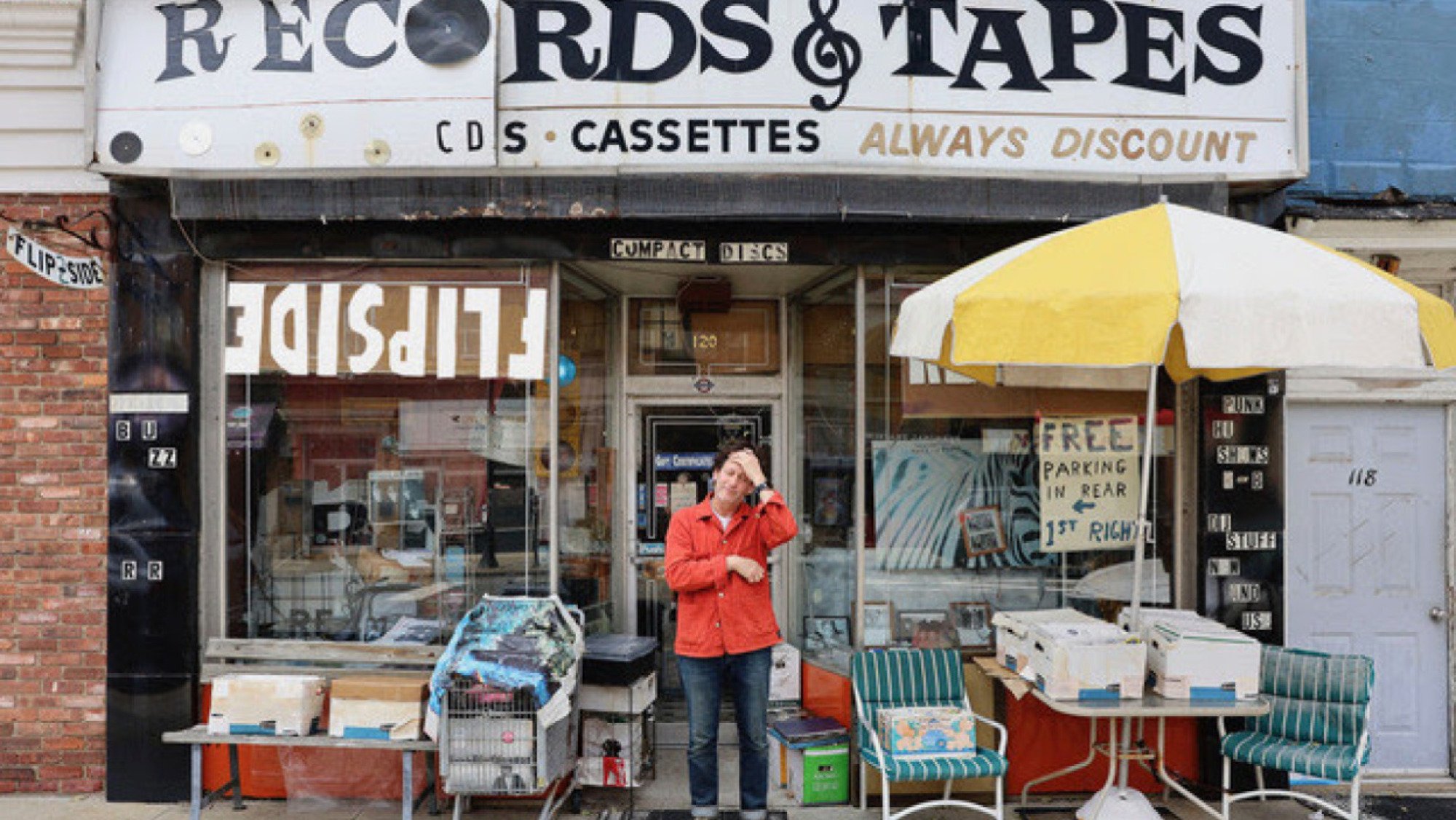 Chris Wilcha stands in front of the Flipside record store.