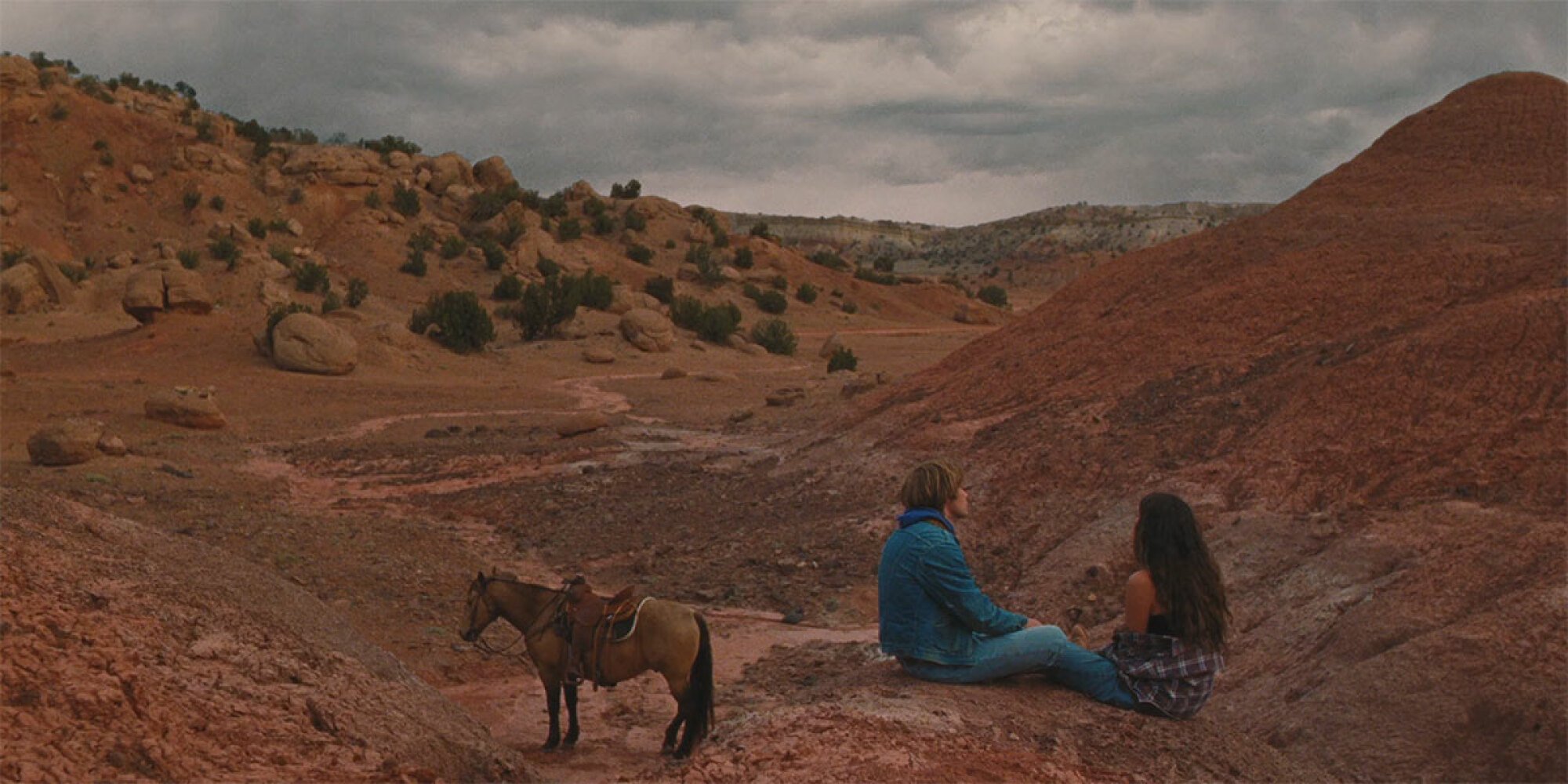 Charlie Plummer and Eve Lindley enjoy the open dessert in "National Anthem."