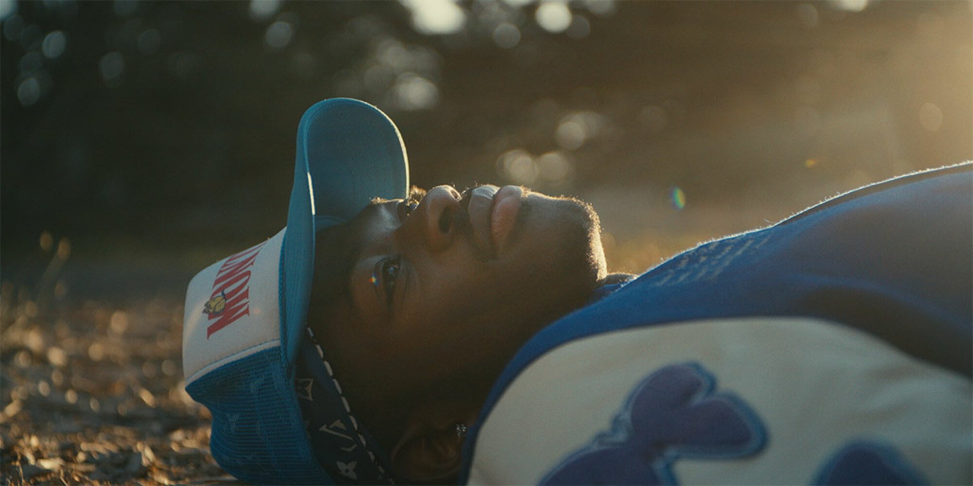 Lil Nas X relaxes in a shot from "Lil Nas X: Long Live Montero."